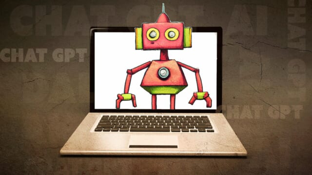 ノートパソコンの画面に映ったロボットのイラスト